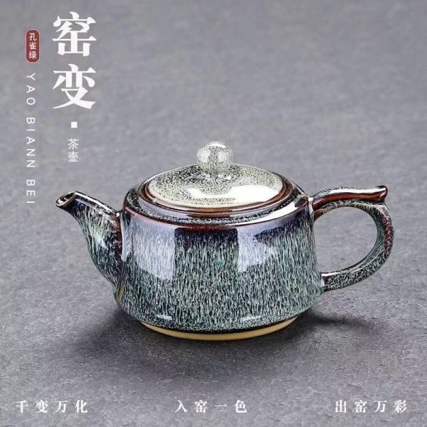 The peacock-green kiln-transformed teapot